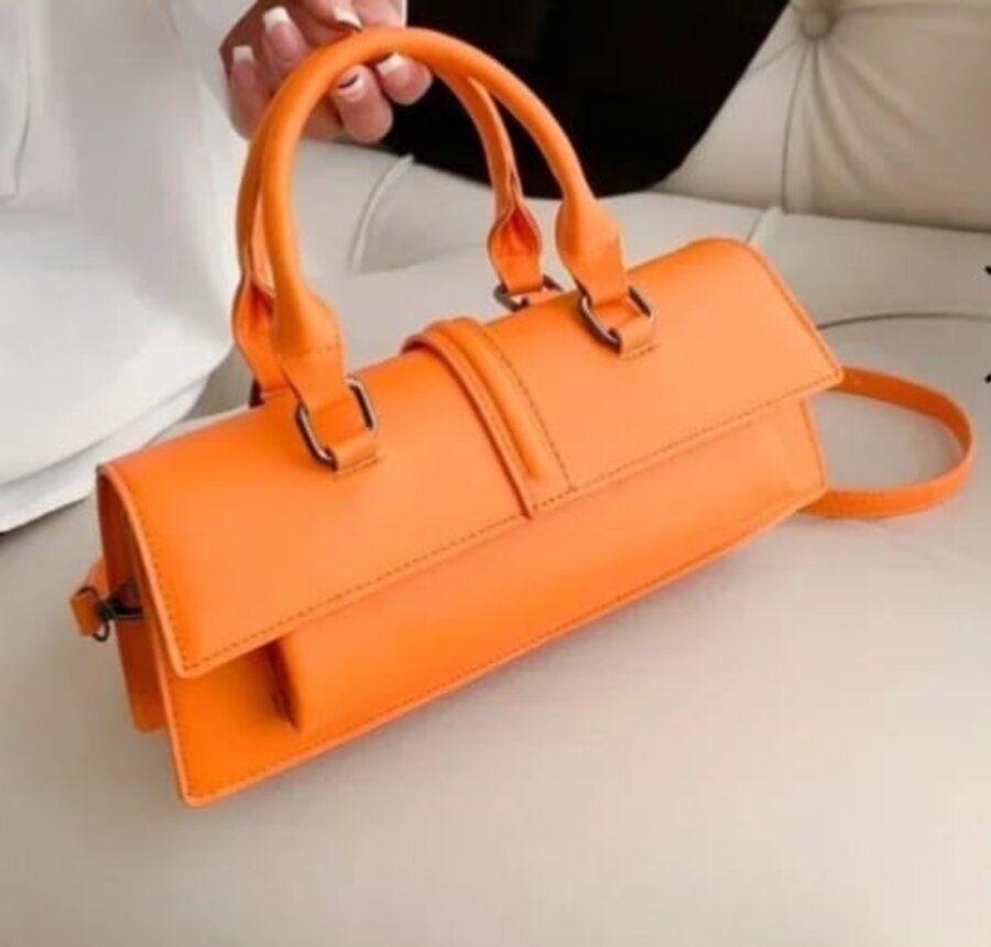 Batwa Travel Duffel in orange canvas with vegan leather trim