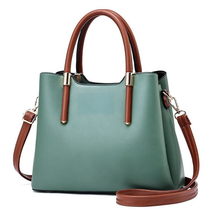 Green structured tote with tan handles
