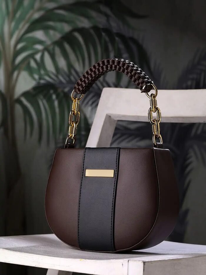 Deep green tote with croc-effect trim and tassel