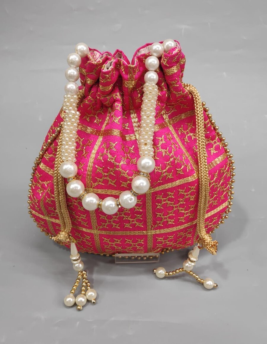 Batwa Potli in magenta embroidered vegan leather with pearl drawstrings
