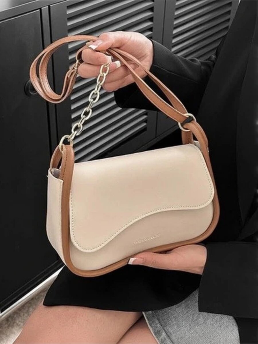 Batwa Sling Bag in cream microfibre vegan leather